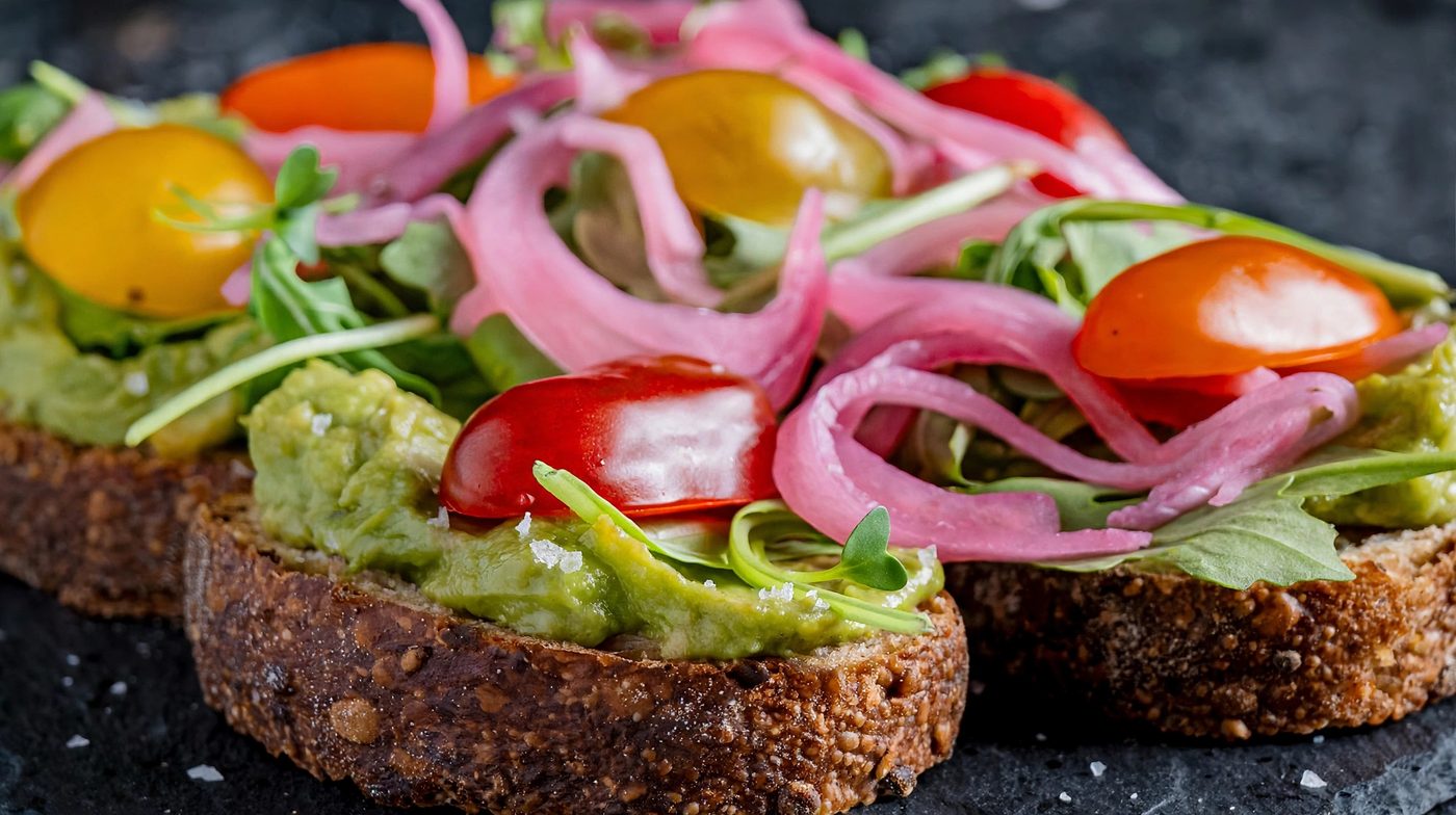 Avocado toast with pickled onions and heirloom tomatoes — Wilde dinner
